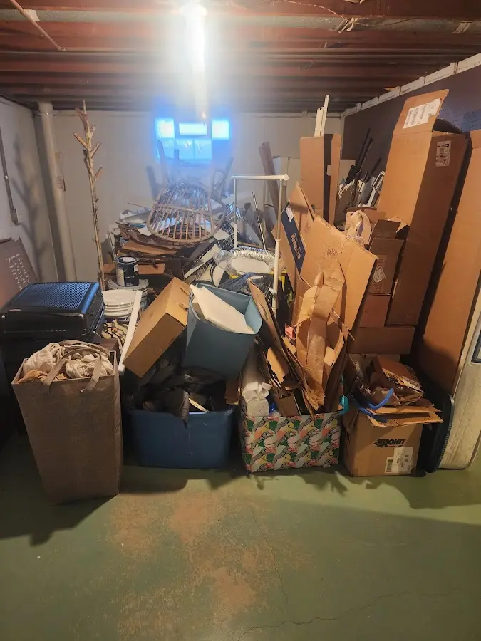 Roll-off dumpster container at job site for Cleanout Dumpster Rental in Russell